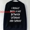 I Really Need A Day Between Saturday And Sunday Sweatshirt